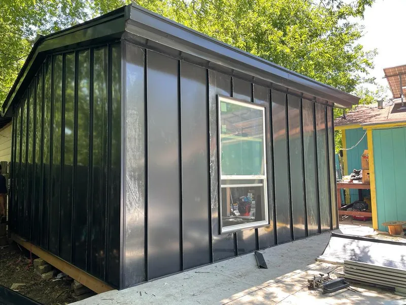 Black standing seam metal wall panels for Roof Inspection in Peoria